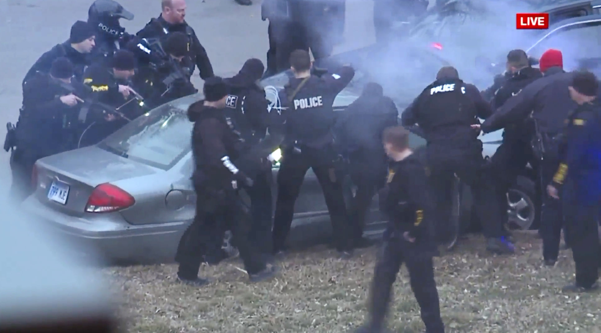 Car surrounded at Super Bowl parade